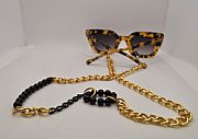 Handmade chain with gold and black rings : 1